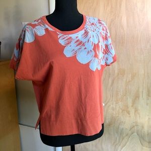 Anthropologie terracotta dolman sleeve shirt w blue floral print & side slits S